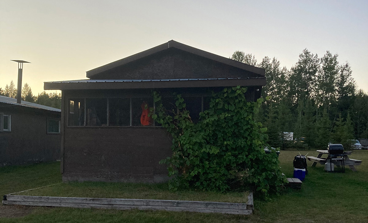 Gathering Lake Outfitters Cabin Exterior Evening